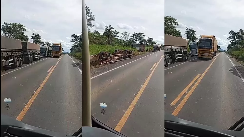  Vídeo: Carreta rodotrem de 9 eixos carregada de milho tomba na BR-364 a 13 km de Ji-Paraná
